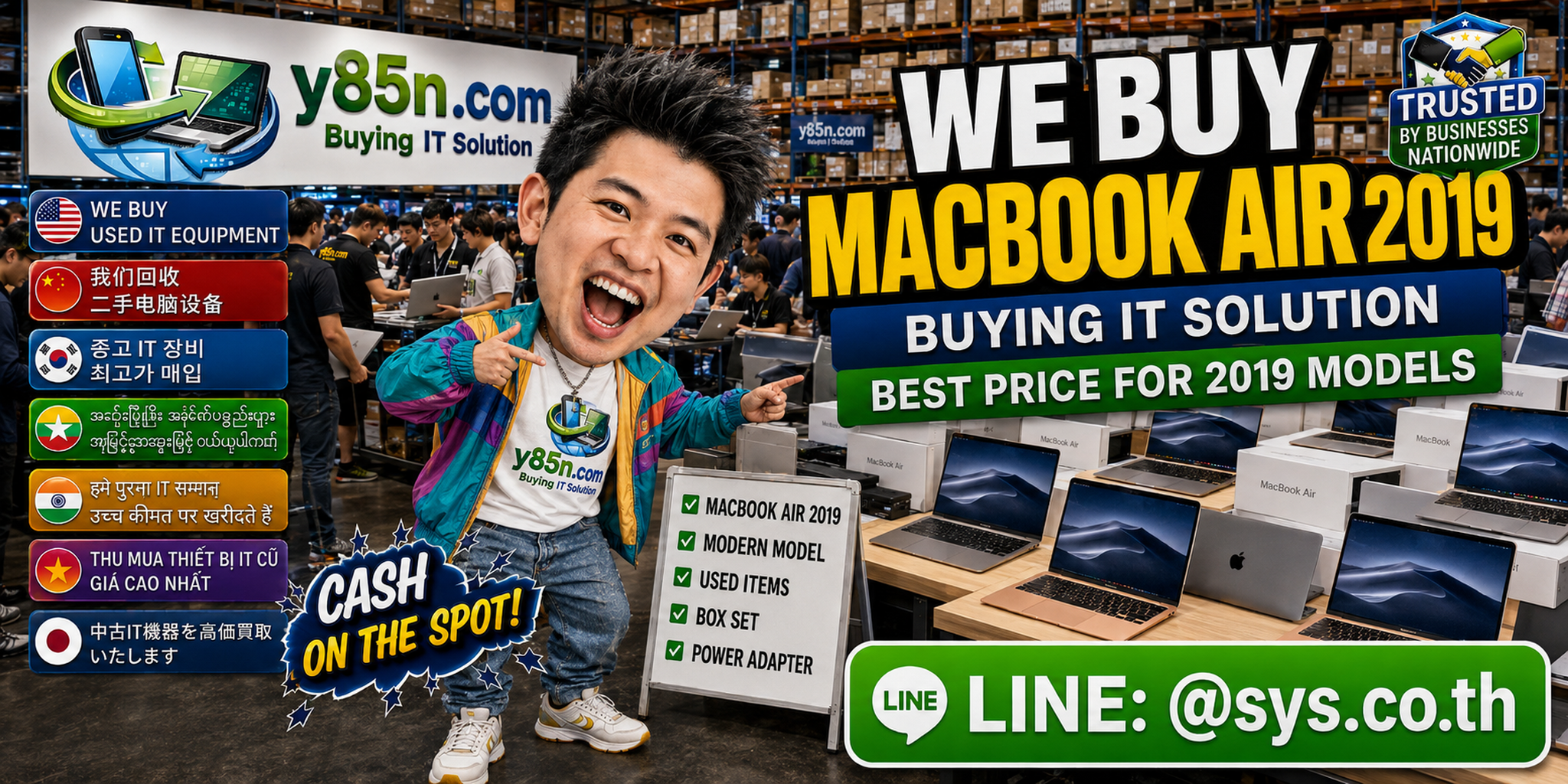 Y85N.com team reviewing MacBook Air 2019 devices at a busy computer warehouse